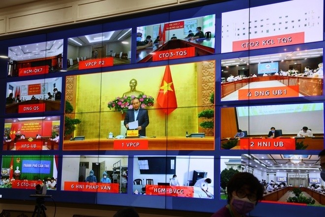 Thủ tướng Nguyễn Xuân Phúc chủ trì buổi hợp với các địa phương. (Ảnh: Trung tâm báo chí TP.HCM)
